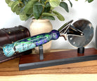 Artisian Pizza Cutter head with blue dye stabilized maple burl handle and purple green alumilite resin - Jakob Janssen Studios